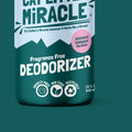 Cat Litter Miracle fragrance-free deodorizer bottle on a teal background