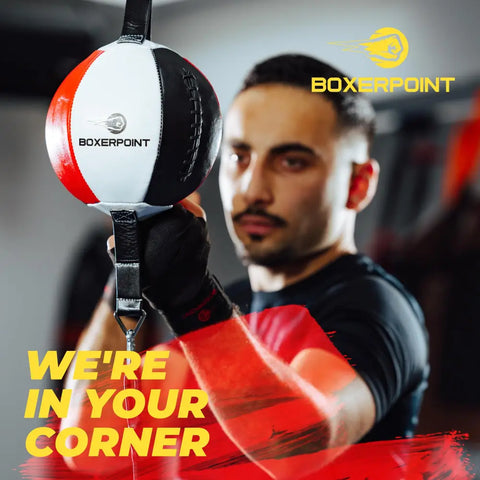 Red, white, and black boxing speed bag.